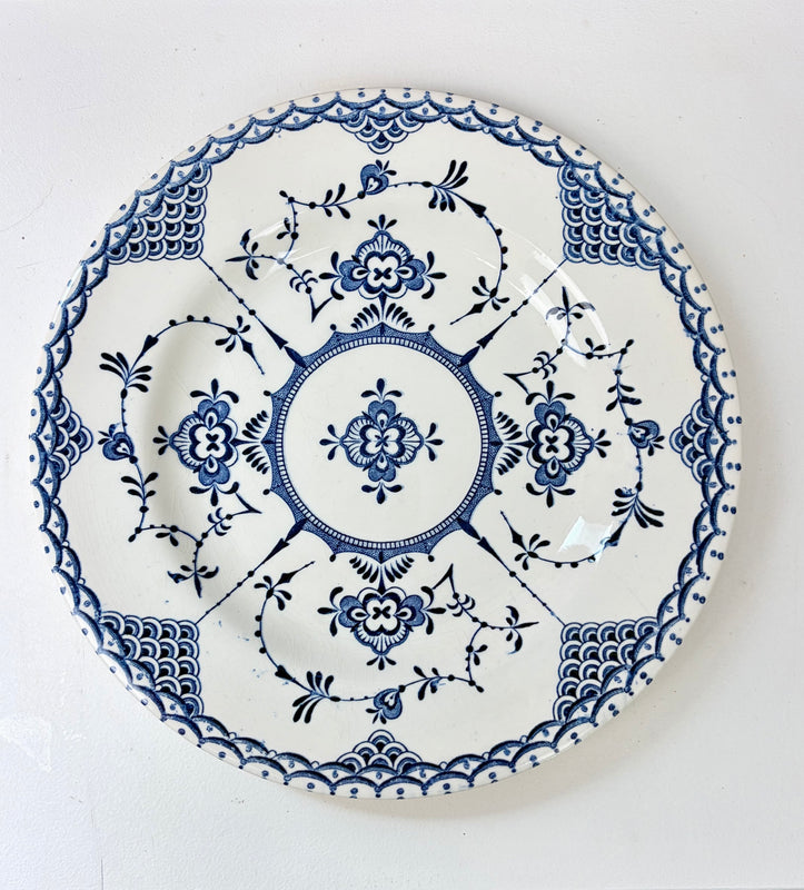 Overhead view of the E.I.T. Blue Onion side plate showing the central medallion, four floral sprays and scalloped lace border