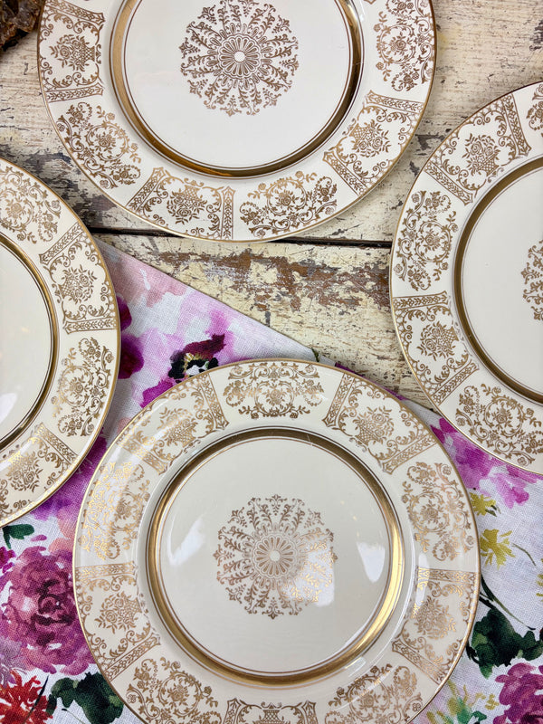 Vintage Johnson Bros gilded filigree dessert plates, set of four, top-down view