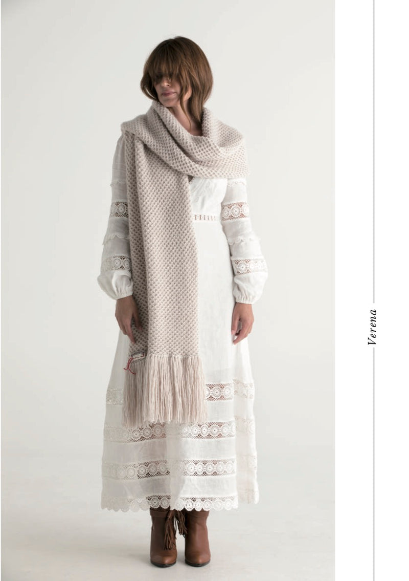 Image of the Verena Honeycomb Blanket Scarf wrapped around shoulders.